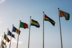 Flags of different shade representing various countries alligned in the air in downtown Ikeja, Lagos 